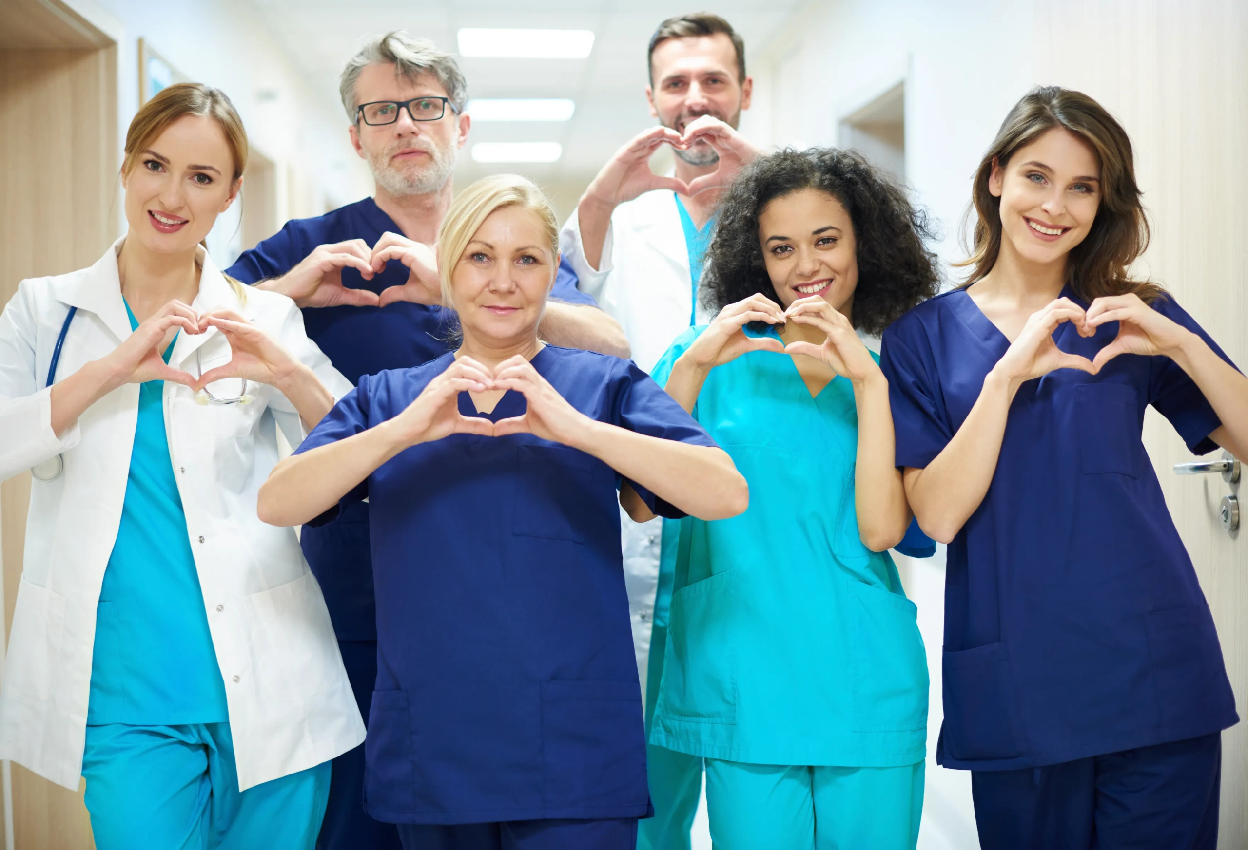 group doctors with heart symbol scaled