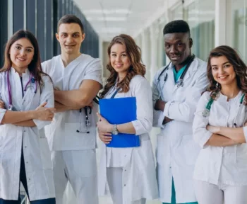 team young specialist doctors standing corridor hospital 1 1