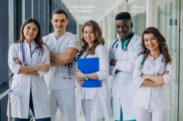 team young specialist doctors standing corridor hospital 1 1